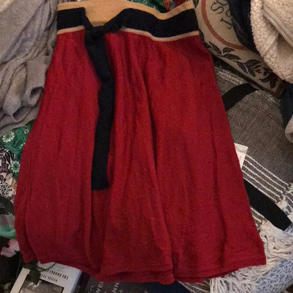Knit skirt with decorative tie at waist. Perfect condition.